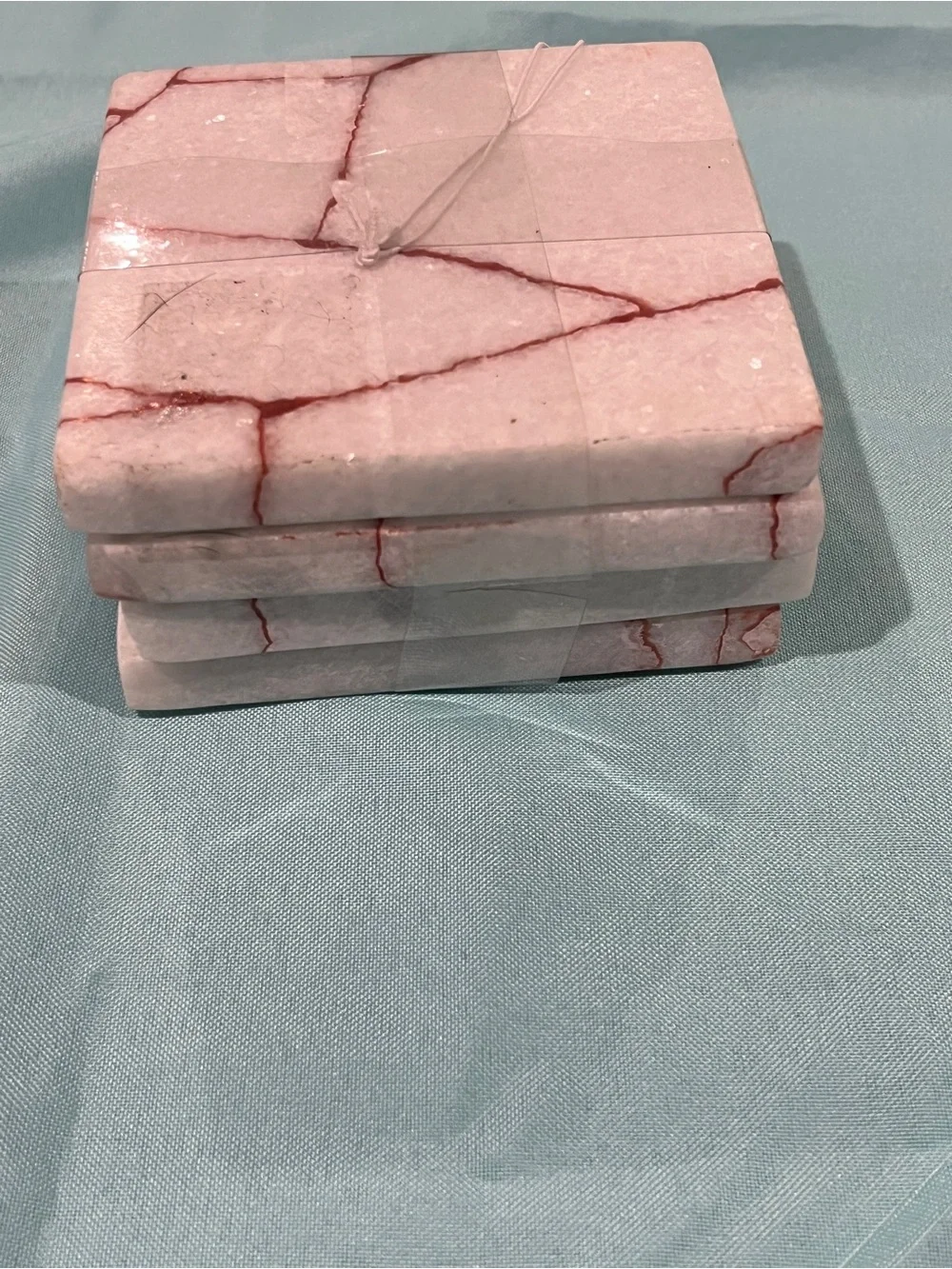 White Marble Coaster Set with Red Veining